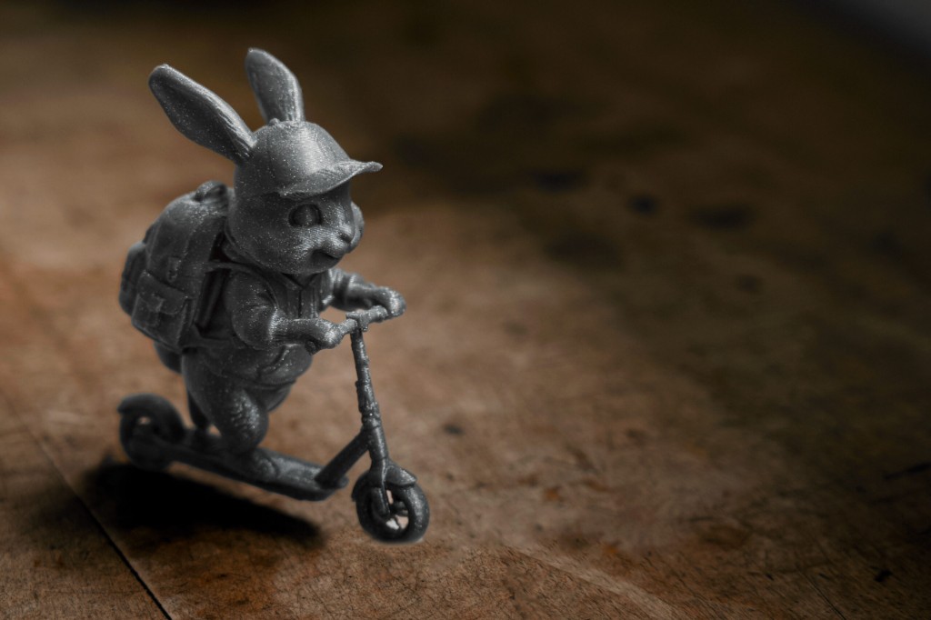 Figurine lapin — trottinette